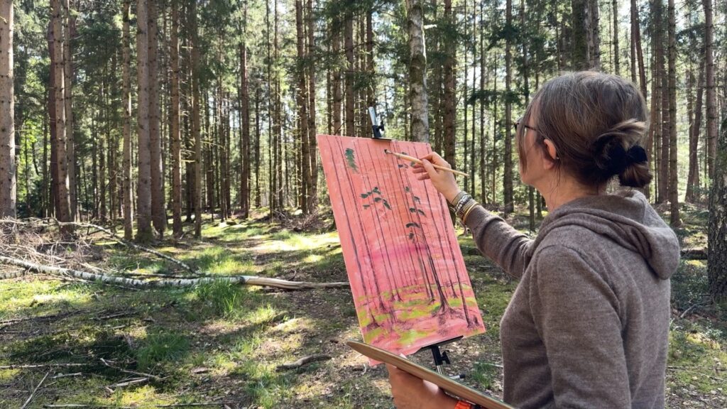 Une séance de peinture en pleine forêt